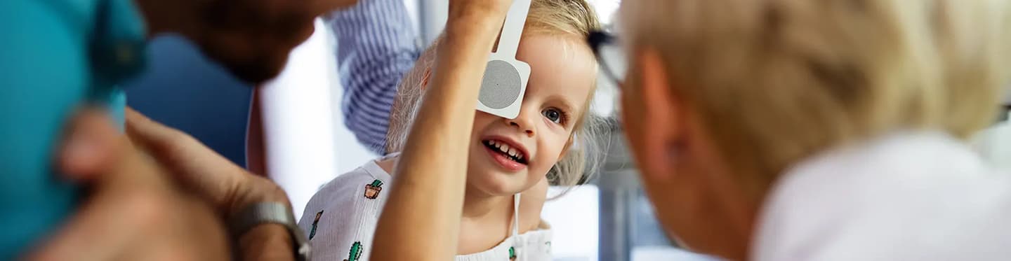 Woman wearing Coach sunglasses